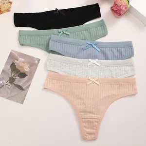 Premium set of 5 ribbed cotton thongs for women featuring elegant bow detail at waist.