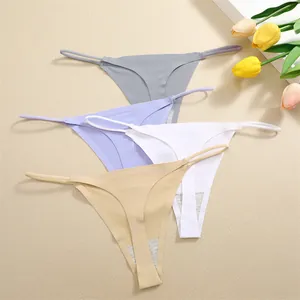 Detailed view of seamless women thongs in four colors: grey, purple, white and beige