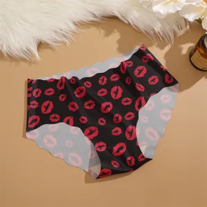Women's mid-waist ice silk seamless panties with sexy red lip print, comfortable daily briefs.