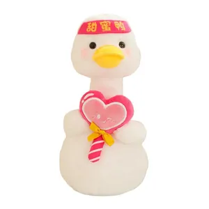 Cute white plush duck toy with pink heart lollipop, perfect for Valentine's Day gifts
