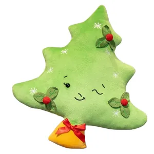 Simpatico cuscino in peluche a forma di albero di Natale verde con fiocchi ricamati