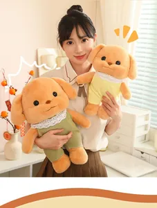 Cute butter poodle plush toy with lace collar outfit held by a model in a warm room