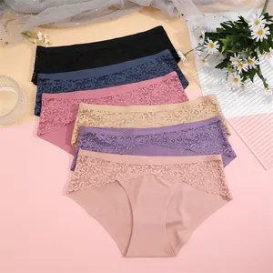 Close-up of seamless low-waist panties with elegant lace patchwork design