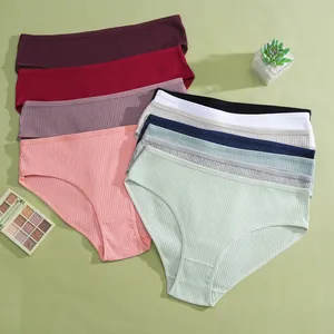 Detailed view of colorful low-rise ribbed cotton panties for women in assorted colors