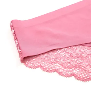 Close-up detail of pink seamless women's underwear with delicate floral lace trim
