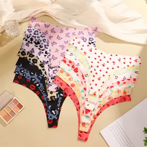 Seamless low-rise thongs for women, sexy print briefs detail view showcasing soft fabric.