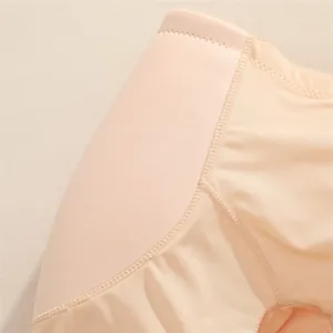 Close-up detail of seamless hip-lifting panty showing fabric texture and fine stitching