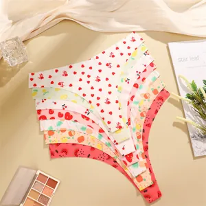 Close-up details of seamless low-waist thong with cute fruit and heart prints for women.