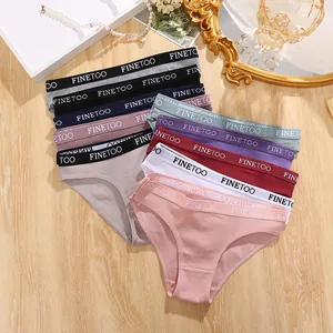 Close-up of multicolored ribbed cotton women's bikini briefs with elastic waistband