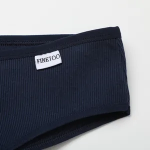 Close-up detail of navy blue ribbed cotton women's panty showing white Finetoo brand label