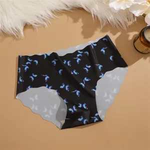 Women's ice silk seamless mid-waist panties with cute blue butterfly print and scalloped edge.