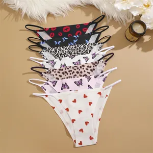 Detailed view of seamless women's panties featuring diverse leopard and heart print patterns.