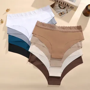 Detail view of various seamless panties with delicate lace waistbands in multiple colors
