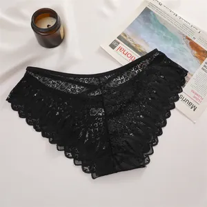 Sexy schwarze transparente Spitzenhöschen für Damen mit Kreuzgurt-Design und Wellenkanten