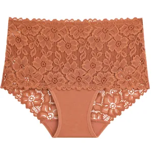Detailed macro view of high-waist floral lace and cotton patchwork panties in terracotta