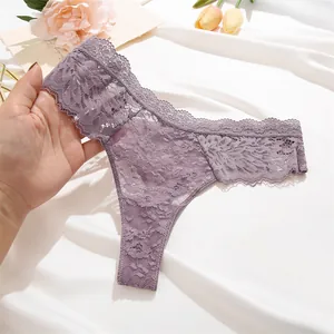 Detailed view of women's sexy sheer lace thong, comfortable mid-waist floral panties.