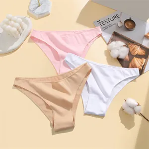 Detailed macro shot of soft cotton briefs in pink, white and nude colors for women