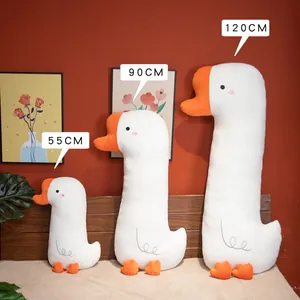 Comparación de tamaños de tres lindos cojines de peluche ganso blanco de 55, 90 y 120 cm.