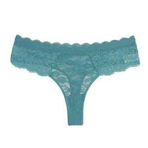 Detailed view of the teal lace women's thong, showing intricate floral patterns and soft fabric.