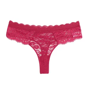 Sexy red lace thong for women, semi-sheer floral mid-waist underwear panty detail view.
