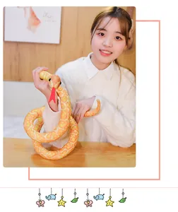 Life-like yellow python plush toy held by a model for studio photography props