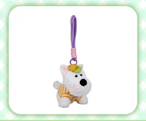 Close-up of West Highland White Terrier plush dog keychain with orange striped shirt