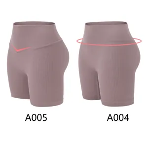 Detail view of high waisted ribbed yoga shorts in dusty rose showing A005 and A004 styles