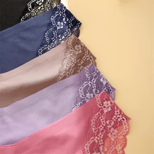Close-up of seamless women's panties with delicate floral lace trim in multiple colors.