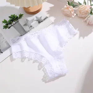 Elegant white cotton bikini panties with intricate floral lace trim and soft fabric