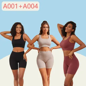 Detail view of women's ribbed yoga set in black, beige and maroon with high-waist shorts