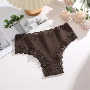 Close-up view of brown cotton bikini panties featuring delicate floral lace trim.