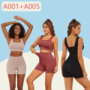 Three women posing in ribbed workout sports bra and high waist shorts yoga sets