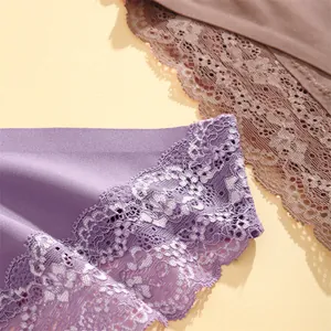 Close-up of delicate floral lace detail and smooth fabric on seamless panties