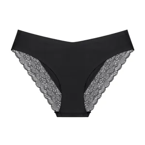 Detail view of black seamless women's panties featuring delicate floral lace trim