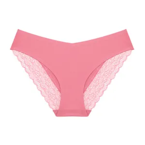 Close-up detail of women's seamless pink panties with exquisite floral lace edges