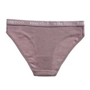 Detailed view of dusty rose ribbed cotton bikini panties with FINETOO logo waistband.