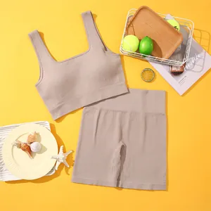 Two-piece ribbed seamless yoga workout set with beige crop top and high waist shorts