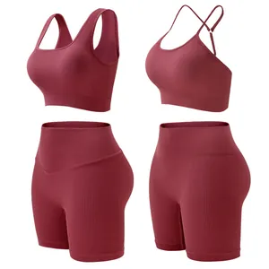 Women's seamless ribbed yoga set with sports bra and high waisted shorts in burgundy