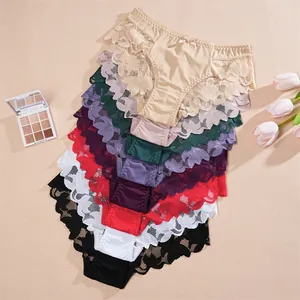 Collection of low-waist lace panties in multiple colors with floral patterns and bows