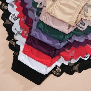 Close-up detail of multi-colored women's low-rise panties with sheer lace trim.
