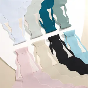 Assorted color seamless thongs with scalloped edges for low waist sport and yoga wear