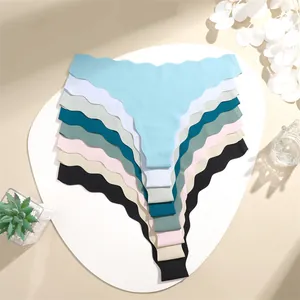 Set of multi-colored seamless low waist women's thongs featuring stylish wavy edges