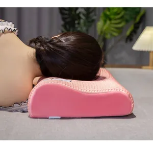 Ergonomic pink waffle memory foam pillow showing soft texture in use for sleeping
