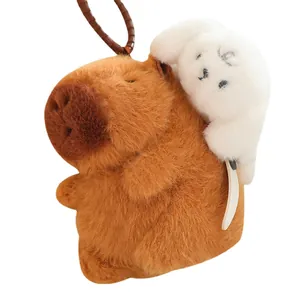 Schattige capibara pluche sleutelhanger met trekkoord en een kleine witte hond accessoire