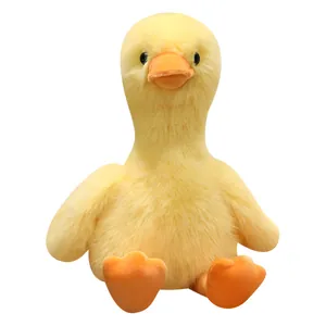 Cute yellow plush duckling toy with soft golden mink velvet texture for children