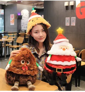 Detailed shot of a woman wearing a festive plush hat and holding cute Christmas toys