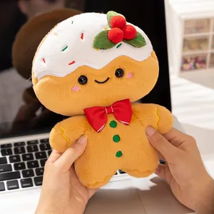 Süße Weihnachts-Lebkuchenmann Plüschtier Puppe mit Sahnehaube und roter Schleife