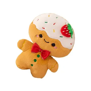 Süßes Weihnachts-Lebkuchenmann-Plüschtier mit weißem Cremeguss und roter Schleife