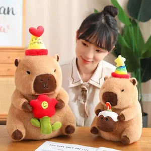 Peluche Capybara mignonne avec chapeau d'anniversaire et fleur, cadeau d'anniversaire