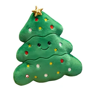 Mignon coussin en peluche sapin de Noël vert souriant avec une étoile dorée décorative